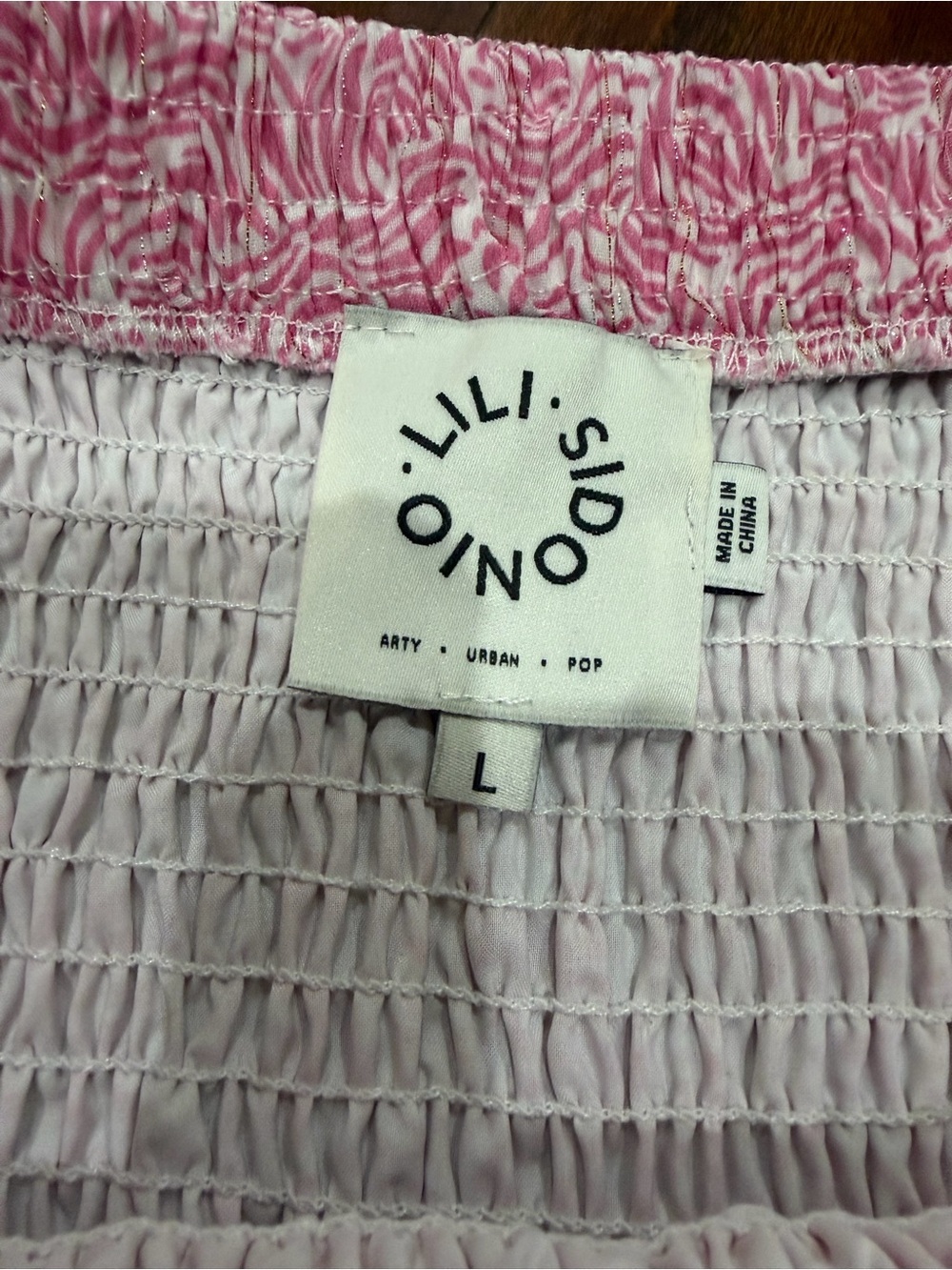 Pink Smocked Mini Skirt with Ruffle Hem - Picture 3 of 4